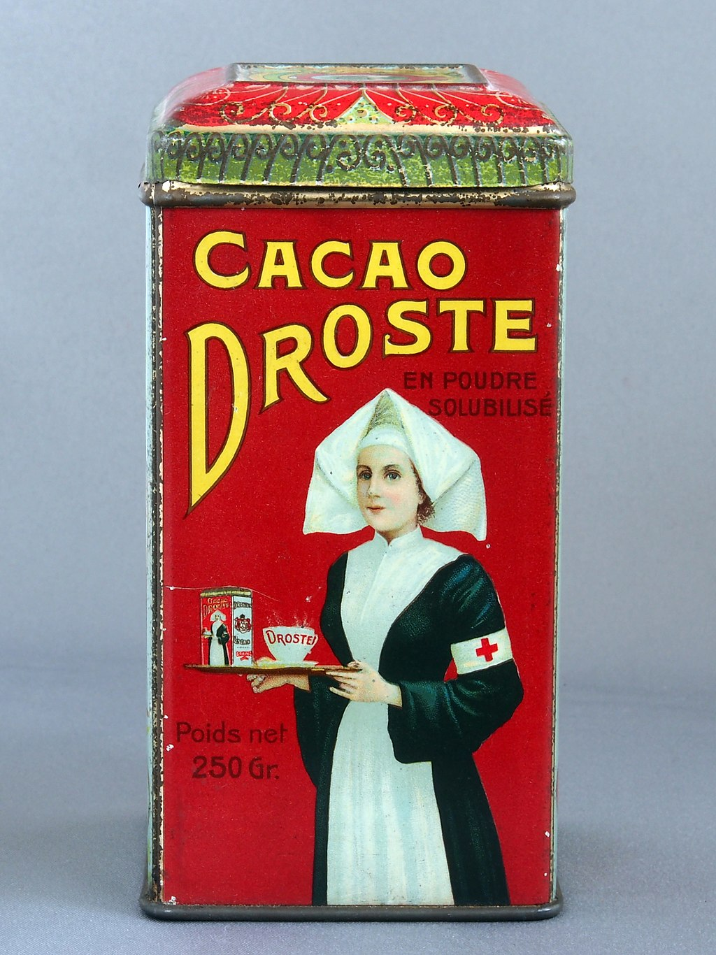 The original 1904 Droste cocoa tin, designed by Jan Musset (1861–1931) (Wikipedia)